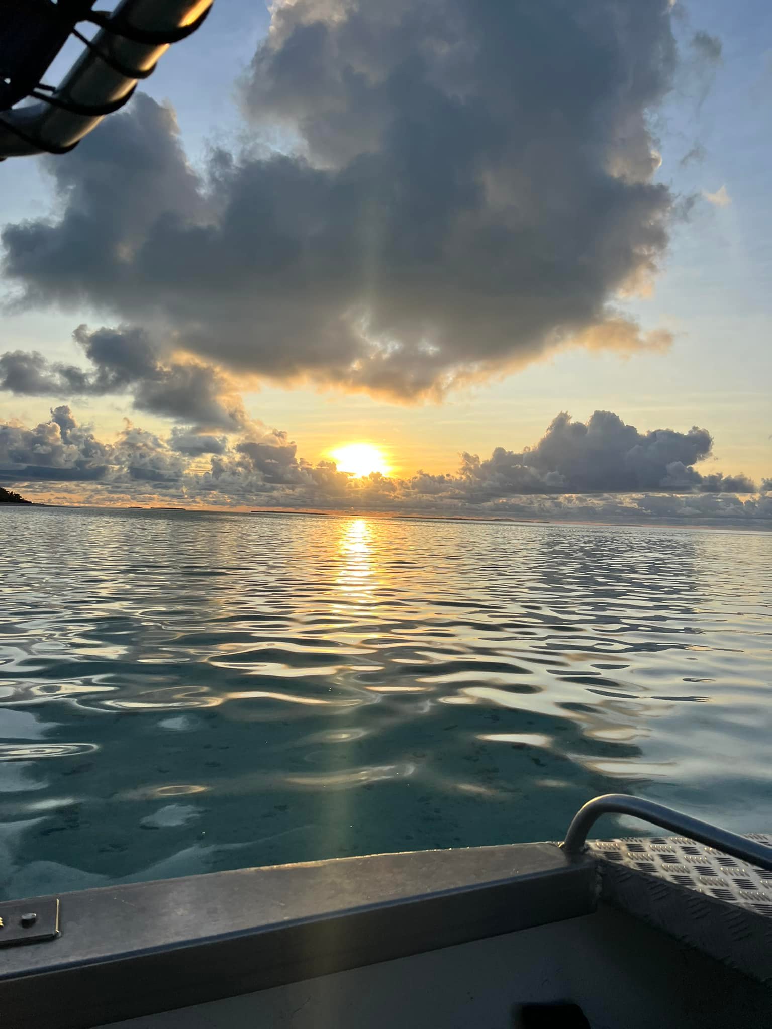 Sunset over the lagoon at Honeymoon Island, Aitutaki
